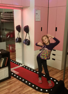Annabelle posing in her dream room at Ikea